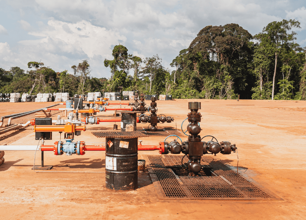 view of an oil or gas field showing multiple well pads.